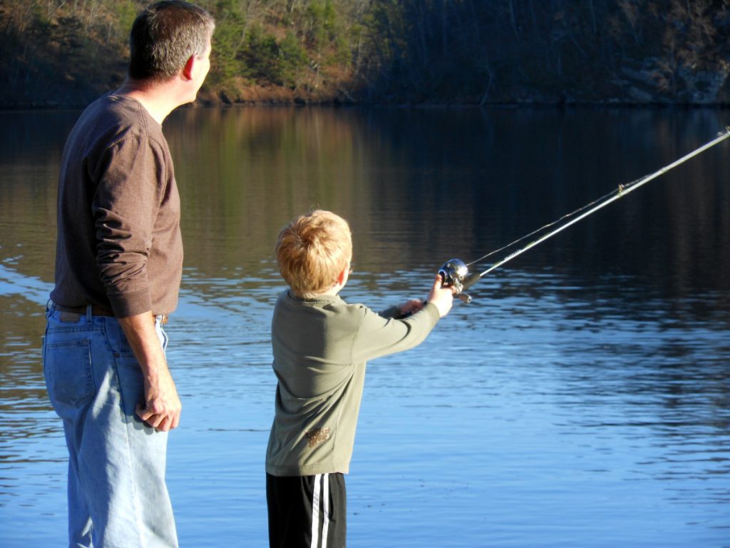 Dave on a fishing trip with his grandson.