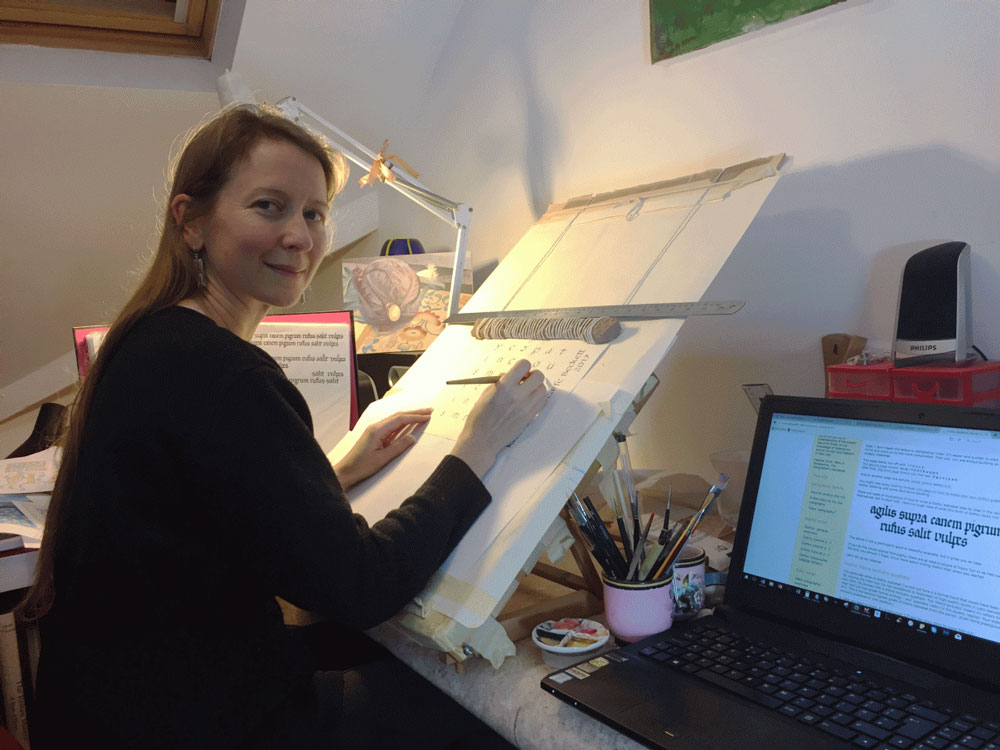 Katharine at work in her home office.