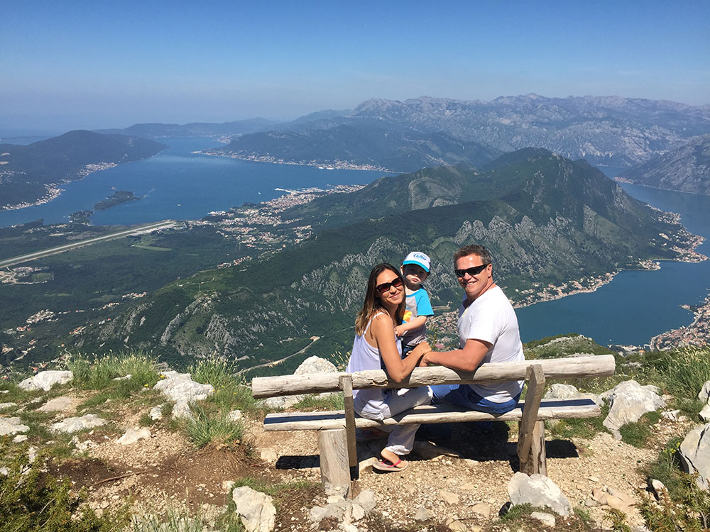 Exploring the Bay of Kotor, Montenegro, with her husband and son.