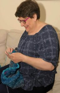 Vickie in action! You can tell she loves her knitting.💙