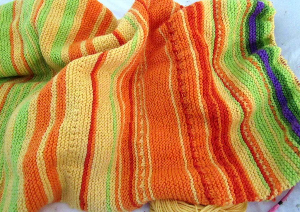 Ever heard of a "temperature blanket"? It's an easy knitting project that you knit over a year. You knit one row per day for a year in a color that matches the temperature in your area.