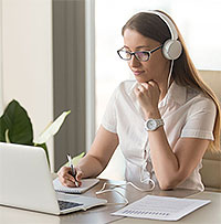 Woman at computer learning about blogging