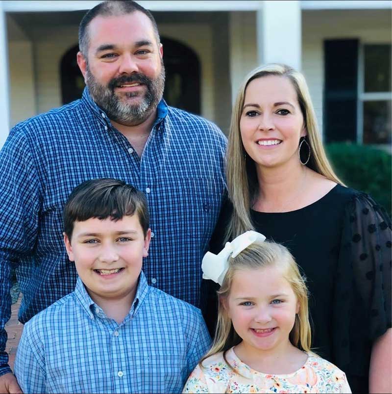 Leslie Dunn with her husband and two children